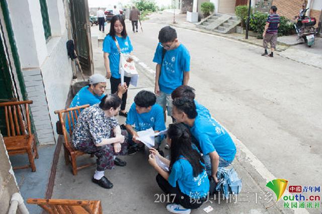太阳成集团tyc33455cc志愿者探访老街 为灾后修复建言献策
