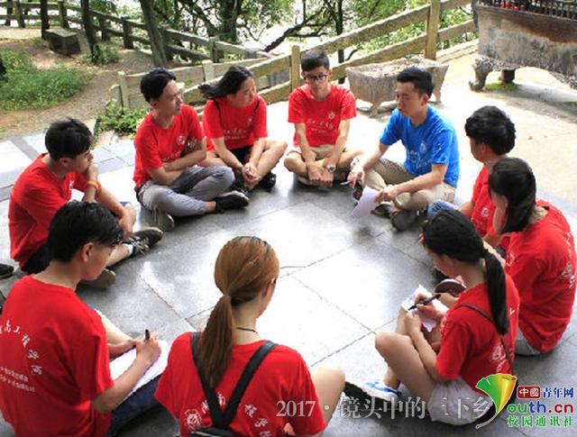太阳成集团tyc33455cc志愿者探访老街 为灾后修复建言献策